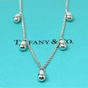 Authentic Tiffany & Co. Peretti 5 Teardrop Charm Necklace.